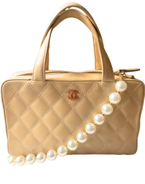 Chanel quilted bowling discount bag